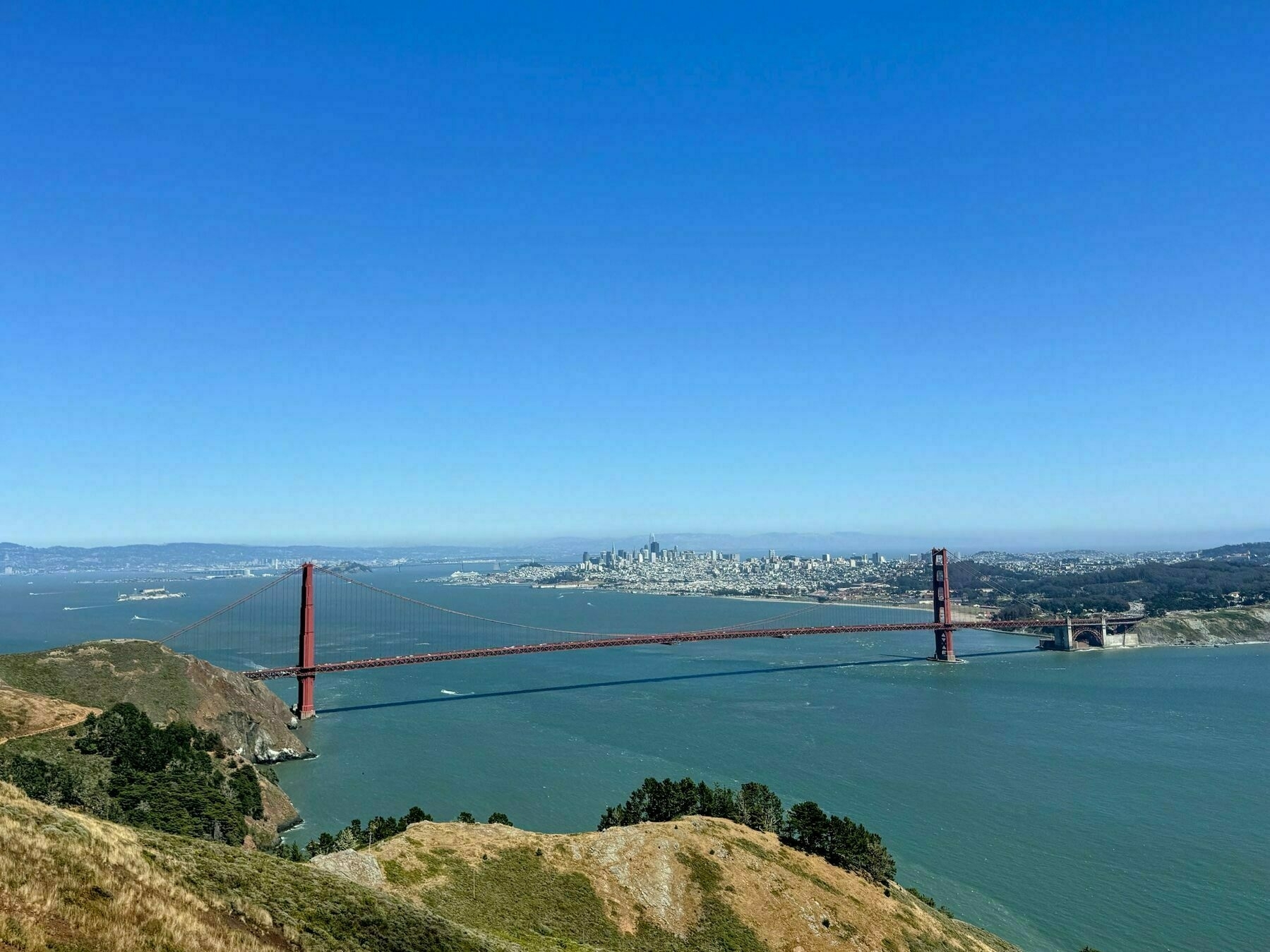 View of San Francisco from Marin Headlands. Golden Gate Bridge in foreground